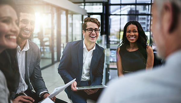 Group of people having a team meeting