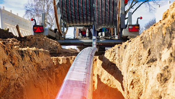 Fiber cables being installed in the ground