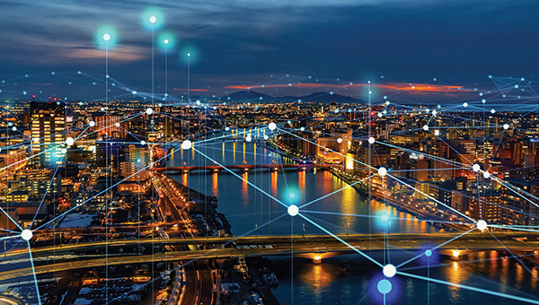 Cityscape with lights connecting infrastructure